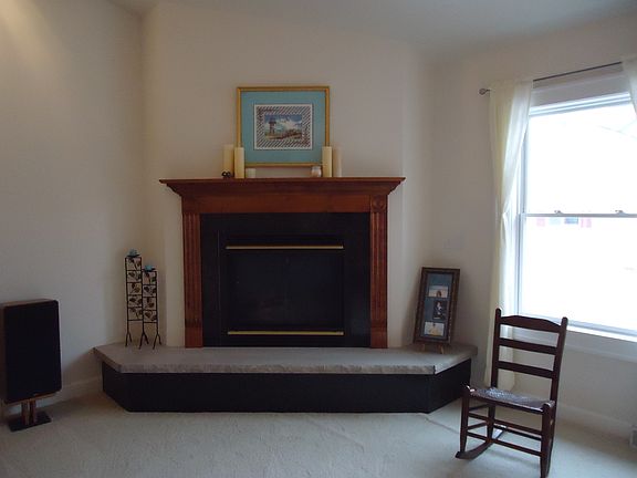 marble and wood fireplace