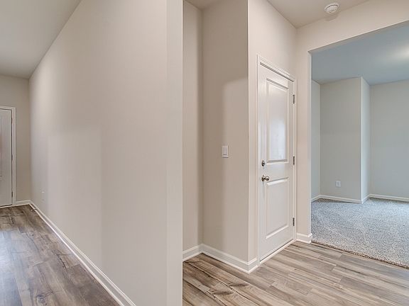 Convenient entryway nook next to garage entrance.