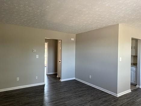 Open living and dining space, leading to the galley kitchen