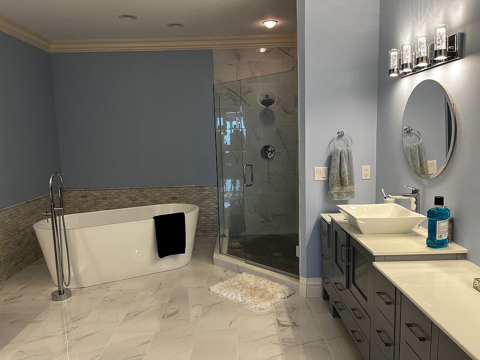 Master bathroom with stand alone bathtub.