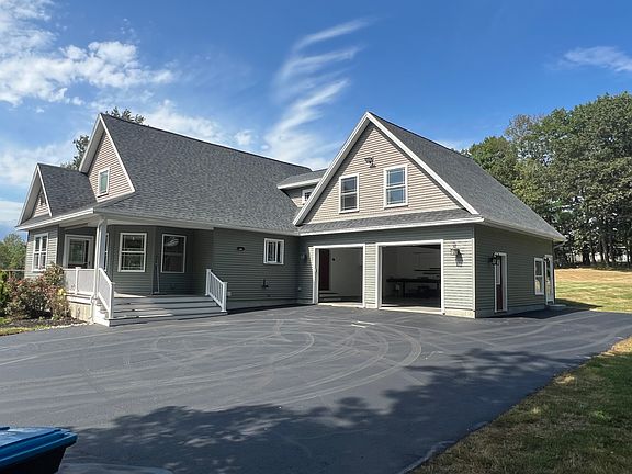 House showing front porch and garage