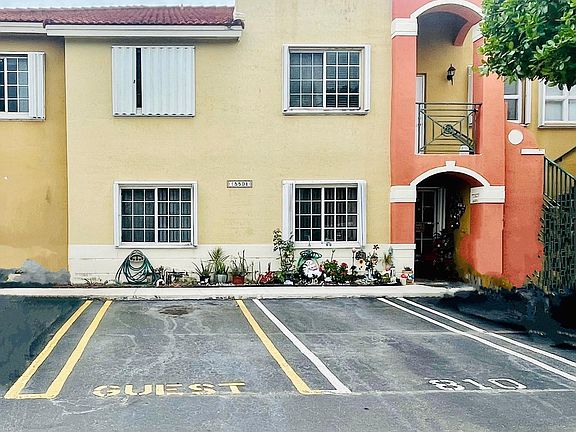 Front Building and Apt Parking Space