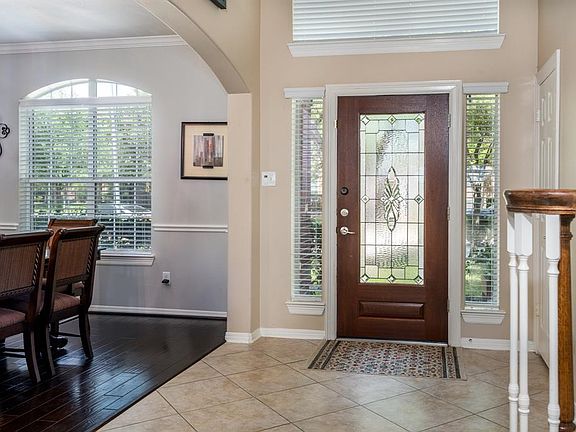 The abundance of windows in the front of the home, allows the natural light to flow into the space!