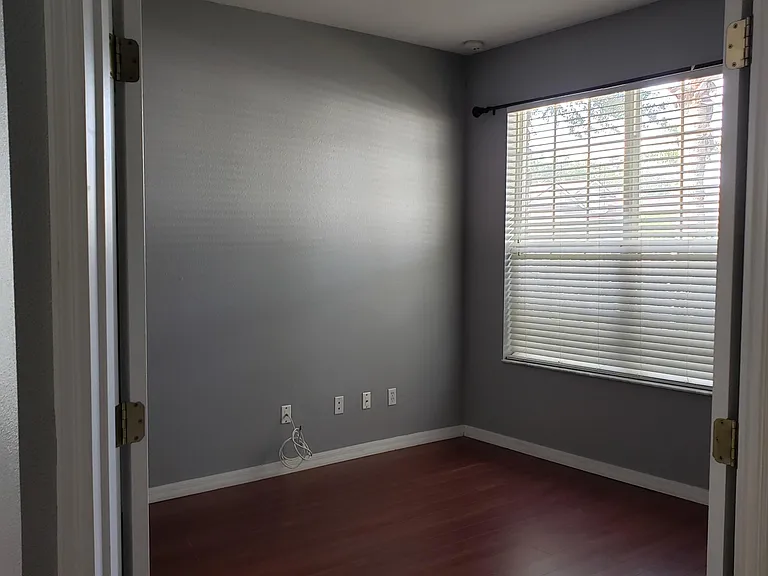 Study or Den with double doors, wood floors. (can be use as 4th. bedroom)