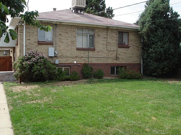 Fully fenced yard with mature trees
