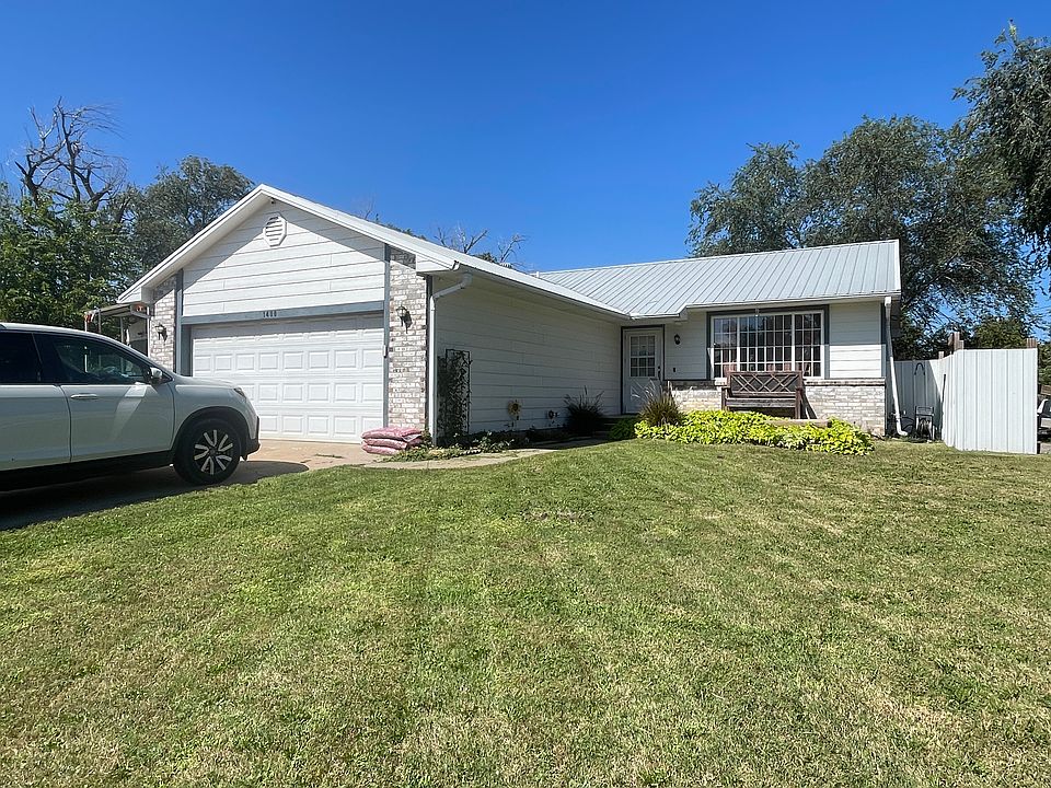 Front of the house with oversize two car garage