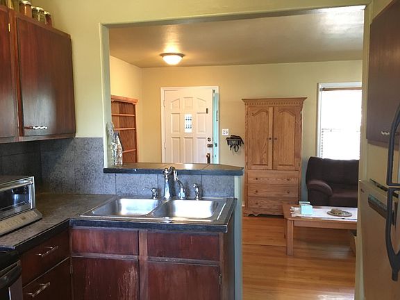 Looking from kitchen at living room and front door