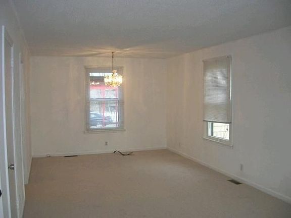 Formal dining with new carpet and windows