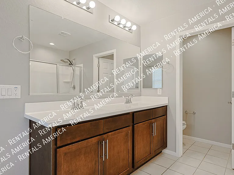 15713 W Woodlands Ave — Photo 25