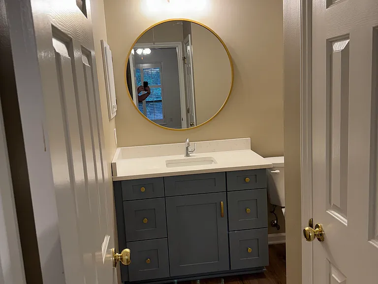 Ensuite master bath with large custom vanity, quarts countertops and full size shower.