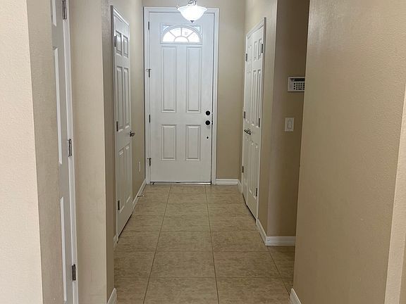 Foyer w/access to half bath, garage, and two large closets