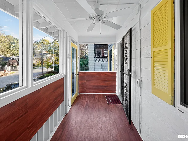 WRAP AROUND ENCLOSED PORCH WITH 3 CEILING FANS