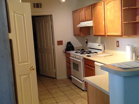 Kitchen with 1/2 bath to the left of photo