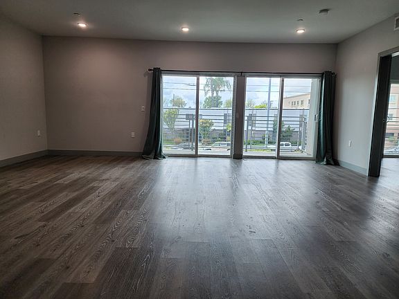 4th image of 7040 Woodman Ave #207
