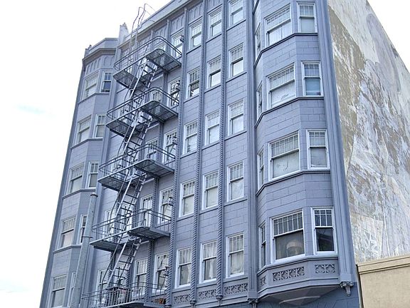 Side exterior view of the apartment building at 665 Eddy St, San Francisco, CA 94109, USA