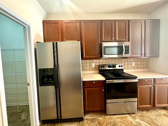 kitchen with large walk-in pantry