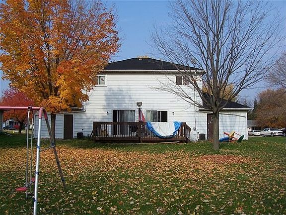Large back yard with a private deck