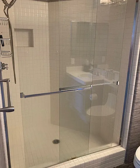 Large shower stall with glass doors