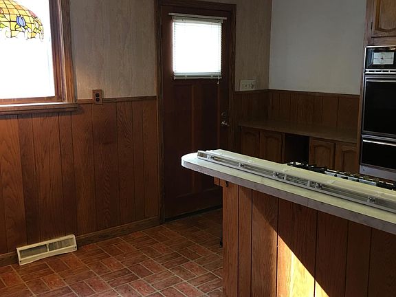 Kitchen with built in oven and cook top