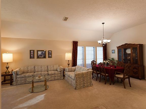 From entry are both formal dining and living rooms.