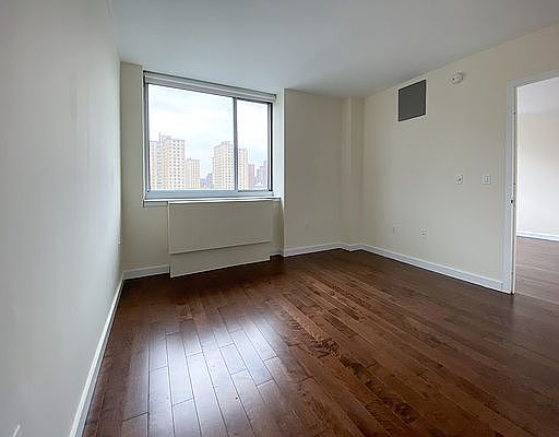 5th image of 310 E 2nd St APT 7K