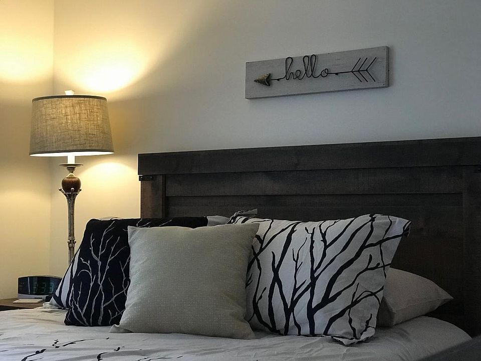 Each bedroom has a queen-sized bed, dresser & flat screen Smart TV (photos depict examples of furnishings which may be in different units)