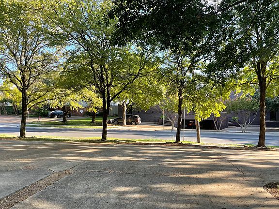 Additional off-street parking for several cars, on-street parking also permitted. Tree protection and more than 40 feet distance to road