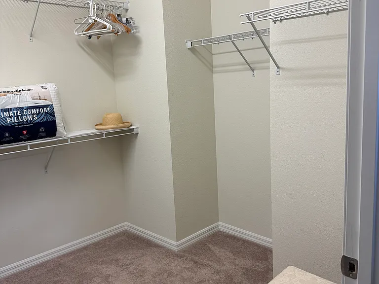 Large primary Closet. All rugs have been professionally cleaned.