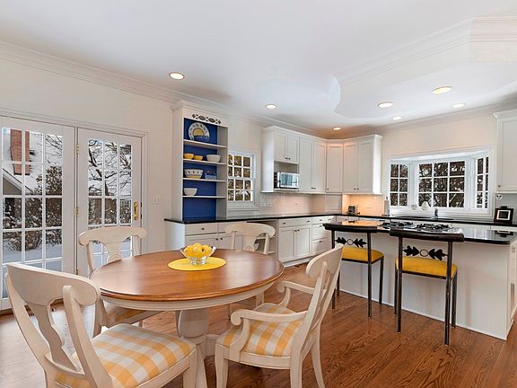 The kitchen has a big breakfast table area as well as countertop seating.  The breakfast area is adj