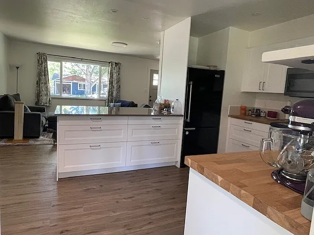 Kitchen looking into living room