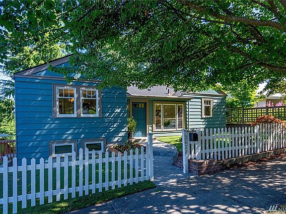 A truly white picket fence abode. 
