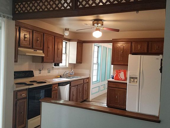 Den to Kitchen to Dining area