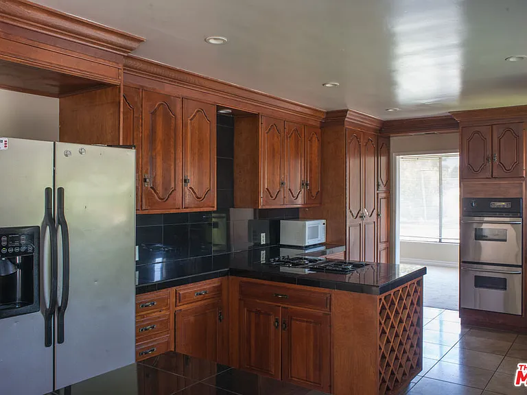 8300 Regis Way — Photo 7