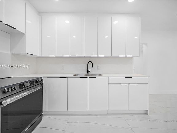 5th image of 5509 NW 5th Ct
