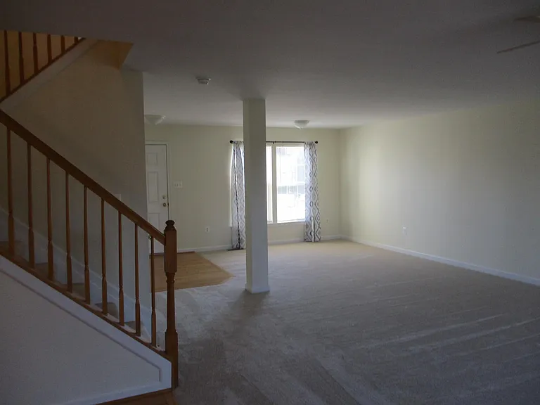 Partial view of family room from kitchen eating area