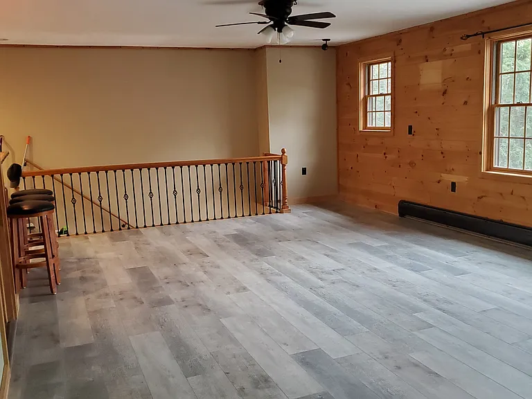 Main/living room view towards stairwell.