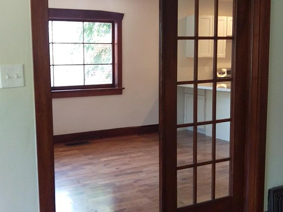 French doors from living room into kitchen and dining