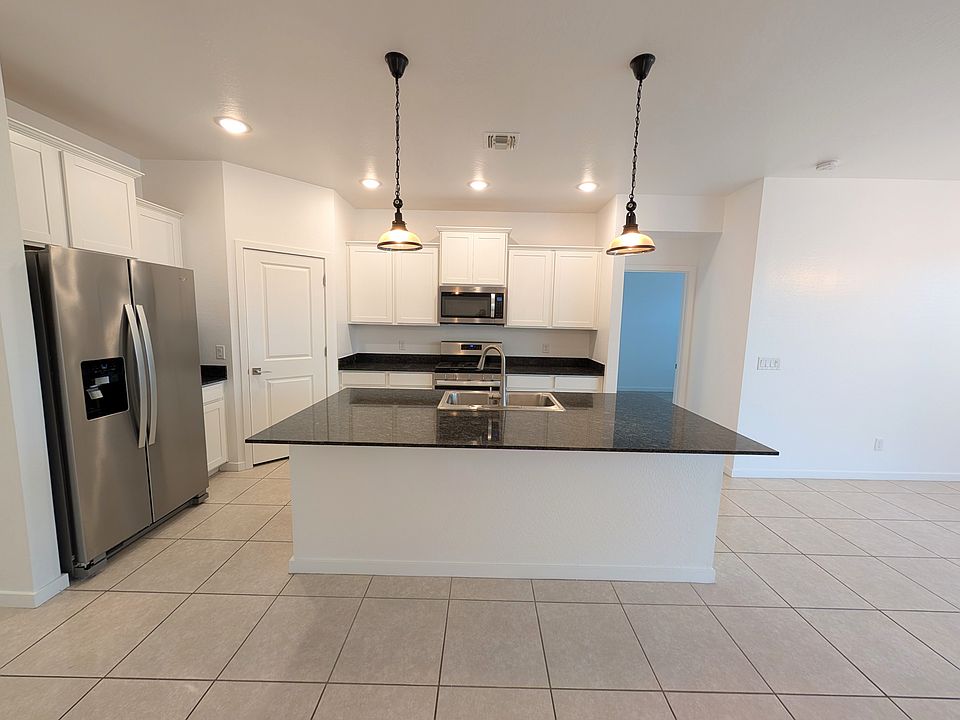 1st image of 40618 W Jenna Ln