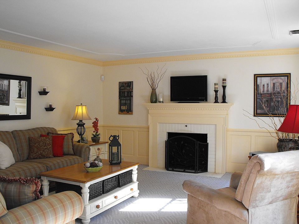 Formal Living Room w/custom ceiling details & fireplace