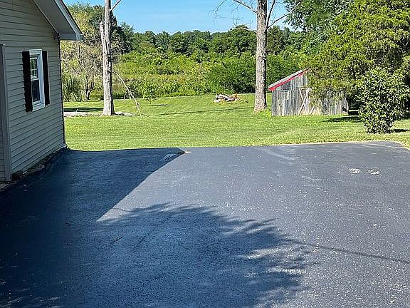 Blacktop driveway.