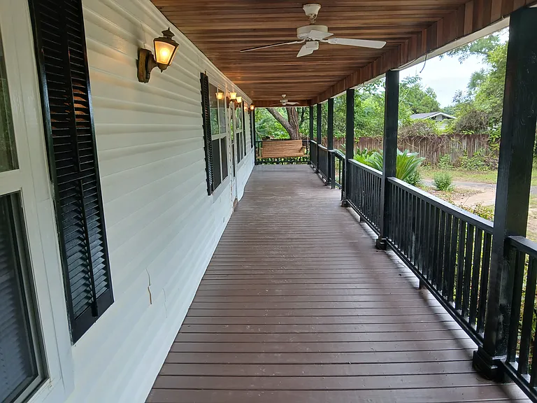 Front Porch East View With Ceiling Fans and Swing.
