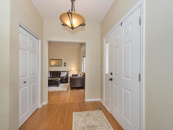 Bright & welcoming entryway features bamboo hardwood flooring that continues throughout the main level.