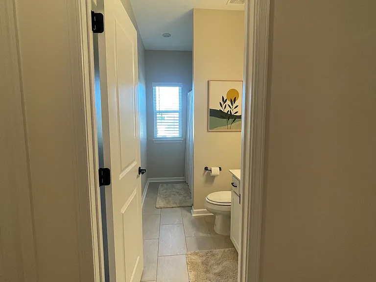 view of upstairs guest bathroom