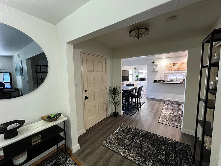 Looking back from the Familiy Room through entry and Dining room into the Kitchen