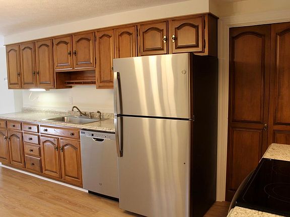 Kitchen with washer/dryer hookup in the closet.