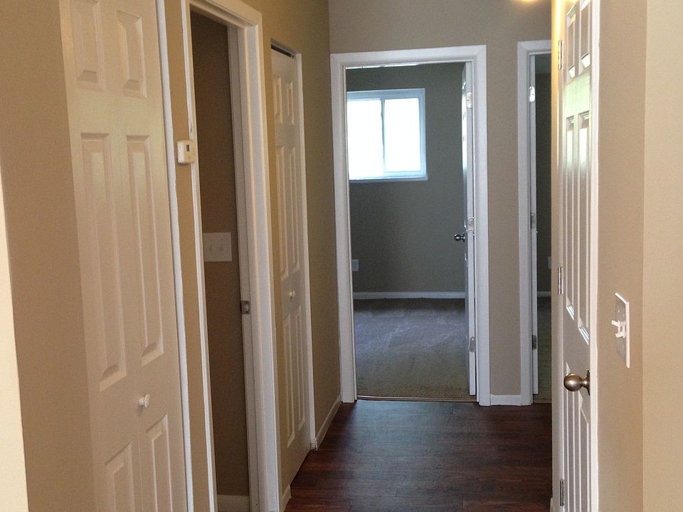 Hallway with Brand New 6-Panel Doors, 2-Tone Paint, & New Ha