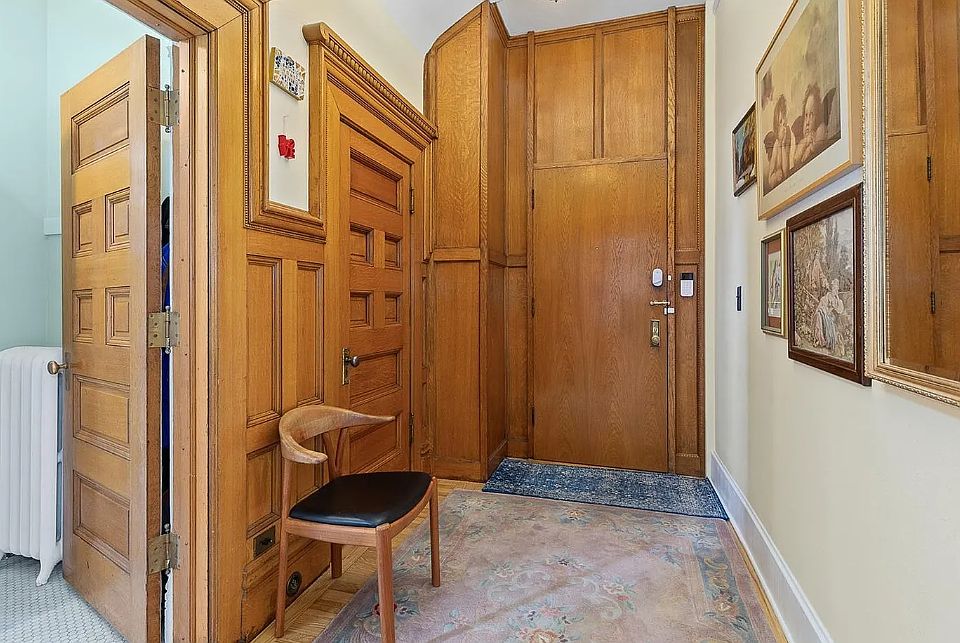 Entrance, coat closet on the left