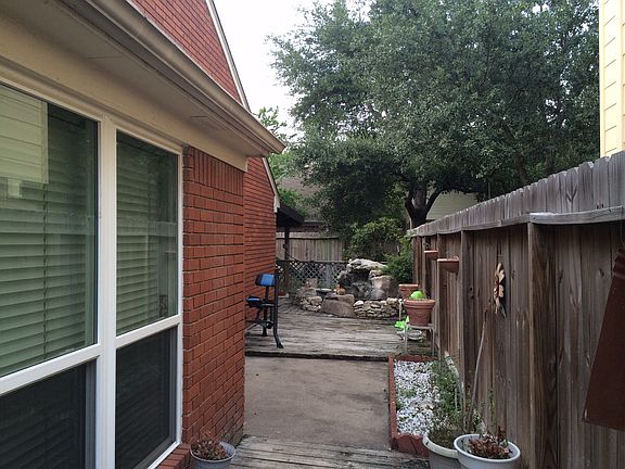 side of home wood/concrete