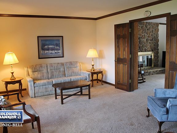 Formal Living Room with French doors to Family Room.
