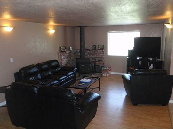 Living room w/ wood stove